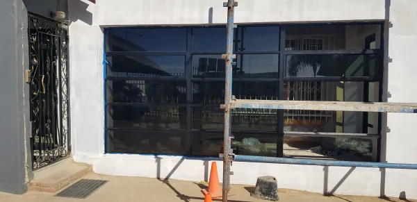 Aluminium frames & tinted glass in progress